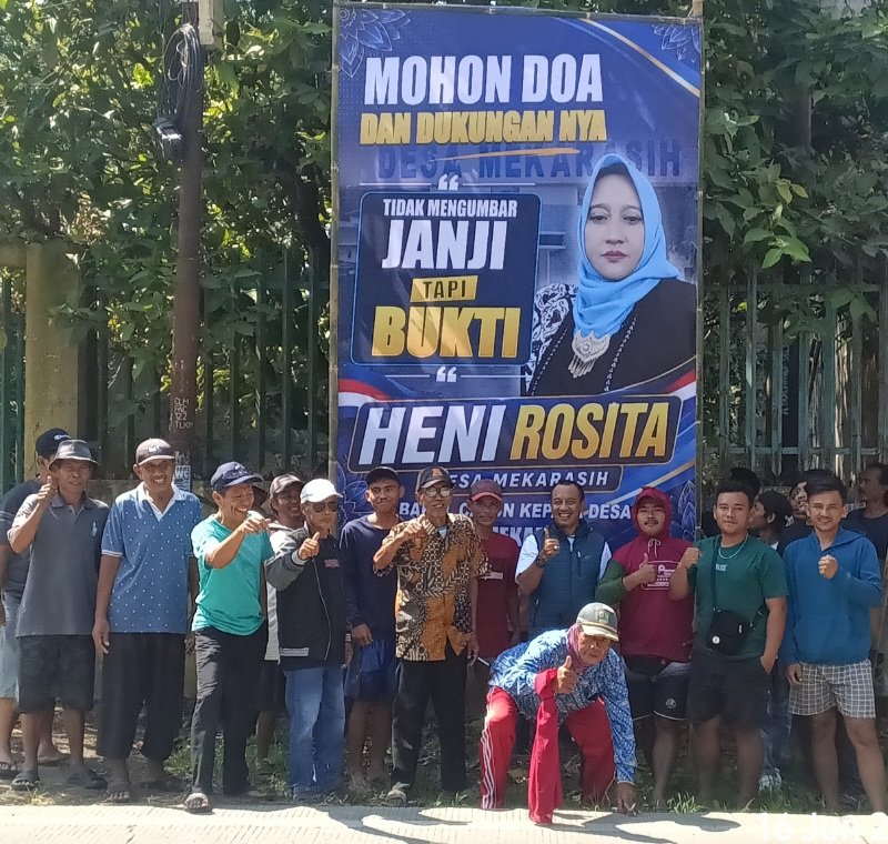 Mantapkan Tekad Maju Pilkades, Hj. Heni Rosita alias Hj. Iyos Pasang Baligo di Seluruh Titik Desa Mekarasih